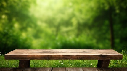 Fototapeta premium wooden table on a green grassy background,