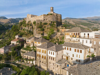 Gjirokaster castle with Clock tower, ottoman architecture houses in Albania, Unesco World Heritage...