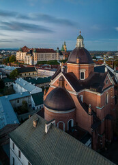 St Peter and Paul church and Wawel castle over Krakow old city during blue hour, Krakow, Poland