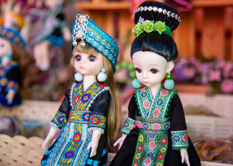 Dolls dressed in bright colours
