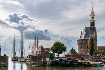 Panoramic view over inner harbor of Hoorn in the Netherlands towards outer harbor with traditional...