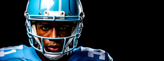 An American football player in a blue helmet. Space for text