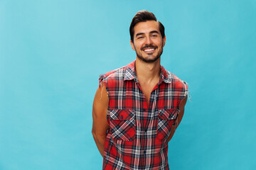 Man attractive isolated guy friendly blue shirt happy smile travel plaid background crossed...
