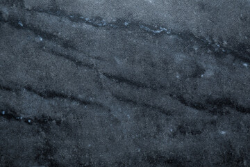 Texture of grey marble stone surface as background, closeup