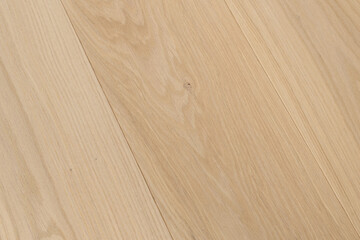 Texture of natural oak parquet. Wooden boards for polished laminate. Background of blank hardwood floor