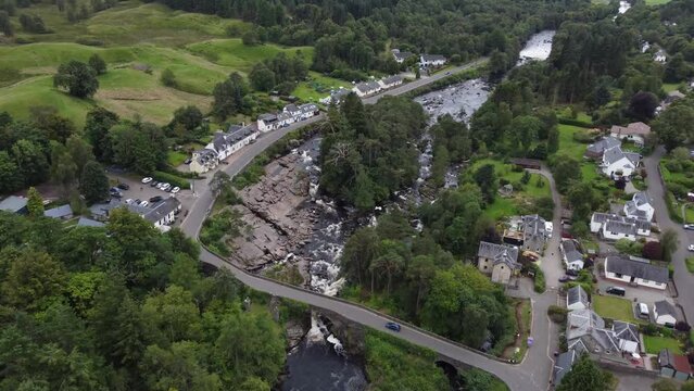 Aerial footage of the Falls of Dochart in Killin, Scotland.