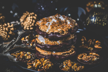 Cookies, gingerbread and Christmas decoration, black and gold