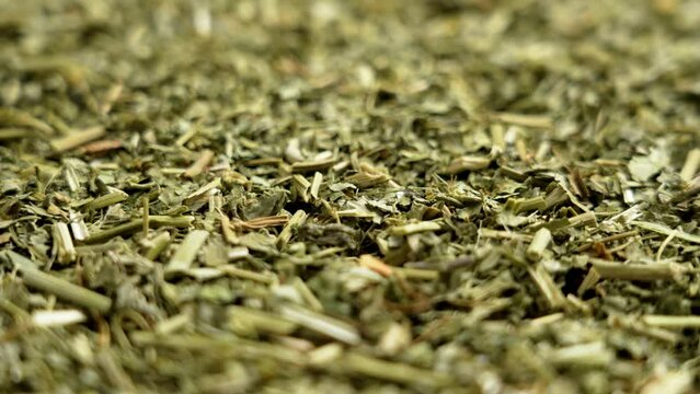 Passion flower dried herbs. Dry Passiflora incarnata. Alternative herbal medicine green ingredient. Rotation
