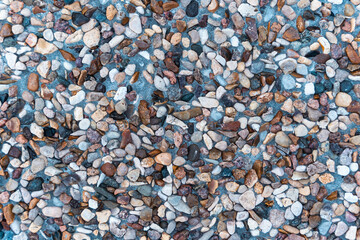 Pebbles and Small Stones Background Texture for Nature and Environment Concept