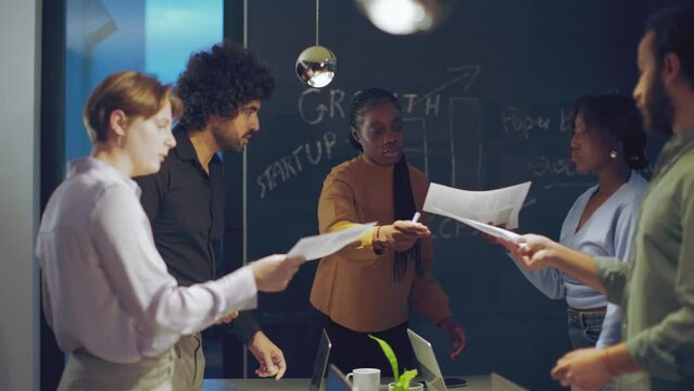 multiethnic young startup business team working together on project