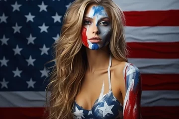 Deurstickers A beautiful young woman with paint in the colors of national flag of USA © Boraryn