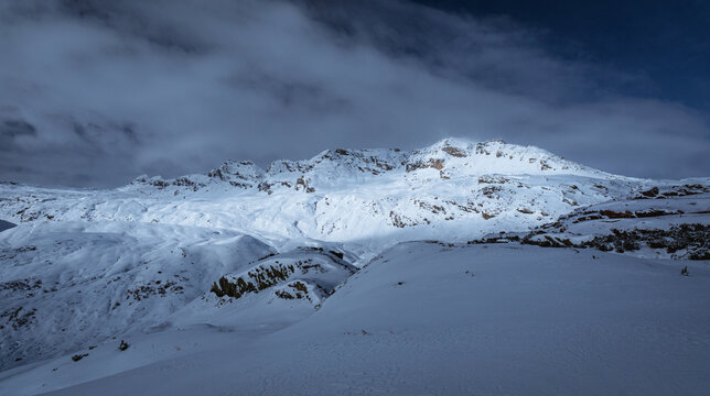 The snowy peaks of Val Mesolcina, near the town of San Bernardino, Ticino, Switzerland - November 18, 2023.