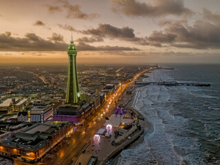 Blackpool, Lancashire, United Kingdom. Blackpool sea front and tower aerial view at dusk looking...