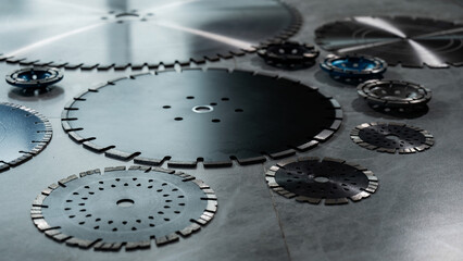 Diamond disks and bowls of different sizes and shapes lie on the table.