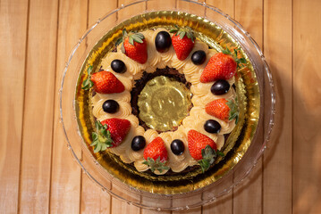 strawberry cake on a wooden background