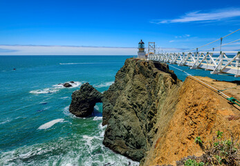 Lighthouse in Pacific ocean on the rock, Point Bonita Lighthouse,  San Francisco, California, USA