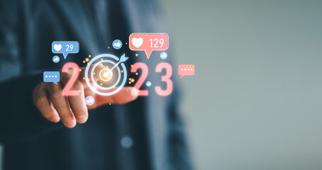 businessman touching on target  2023 for preparation happy new year concept. new business in new years, start up, action plan and strategy in new business.