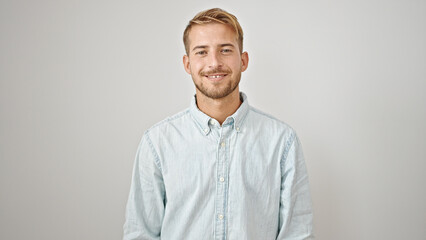 Young caucasian man smiling confident standing over isolated white background - obrazy, fototapety, plakaty