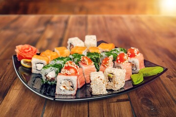 Set of tasty fresh sushi rolls with fish
