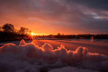 sunset over the iced lake 