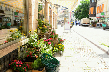 Fototapeta na wymiar Pots with beautiful flowers on street market