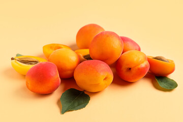 Sweet apricots on orange background