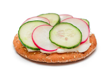 Crispy Cracker Sandwich with Cream Cheese, Fresh Cucumber and Radish - Isolated on White