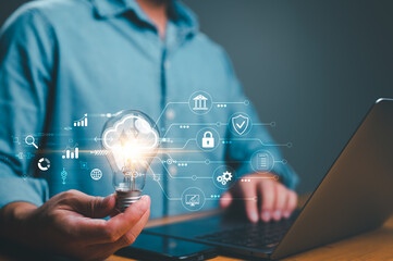 Hand holding Light bulb, Global Internet connection cloud computing. Business global internet connection application technology, digital marketing, Financial and banking, Digital link tech, big data.