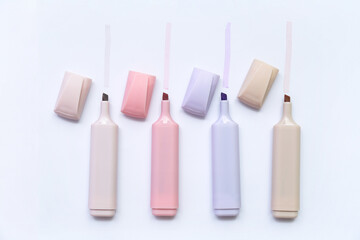 Different markers with strokes on light background