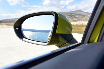Side mirror on a passenger car