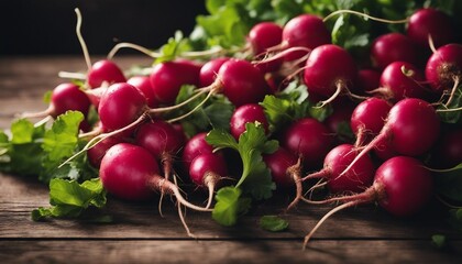 freshly picked organic radishes from the field on a wooden surface
