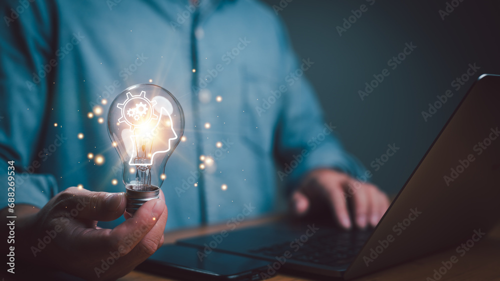 Aufkleber hand holding lightbulb with ai, artificial intelligence. ai digital brain. robotics concept, innovat