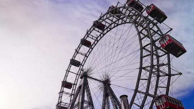 Viennese Giant Ferris Wheel spinning around, at the Prater Park in Vienna, Austria