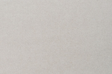 Fototapeta na wymiar Grainy gray color carton paper texture