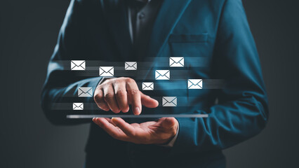 Businessman sending email by smartphone to customer, business contact and communication, email icon, email marketing concept, send e-mail or newsletter, online working internet network.