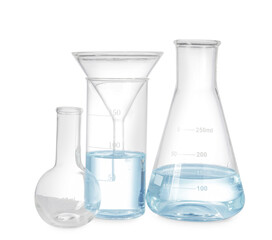 Different laboratory glassware with water isolated on white