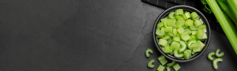 Fresh ripe celery on grey table, top view. Banner design with space for text