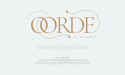 Qorde premium luxury elegant alphabet letters and numbers. Elegant wedding typography classic serif font decorative vintage retro. Creative vector illustration