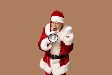 Santa Claus in glasses with megaphone screaming on brown background