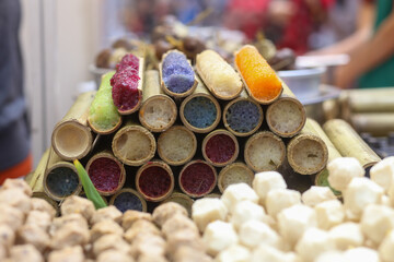 Closeup of colorful bamboo tube rice on the street