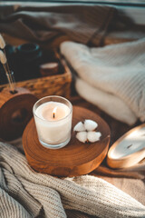 Burning candle in home interior, aesthetics