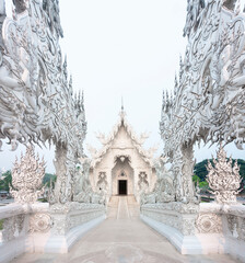 Ornamental bridge crossing into Wat Rong Khun,fantastical White Temple,outskirts of Chiang...