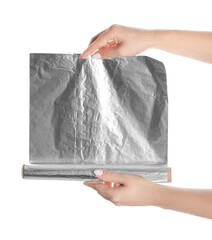 Woman holding roll of aluminum foil on white background, closeup