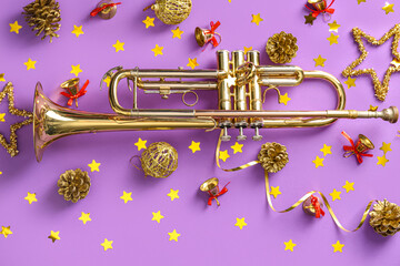 Composition with trumpet and beautiful Christmas decorations on purple background