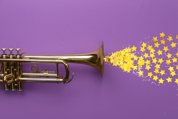 Composition with trumpet and golden confetti on purple background - obrazy, fototapety, plakaty