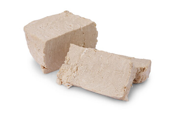Pieces of tasty halva isolated on white