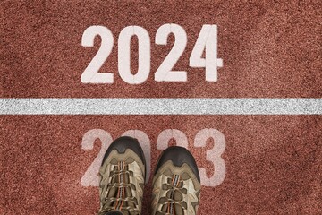 New year concept with 2024 numbers on asphalt road