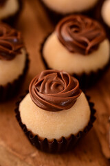 sweets on a plate, close up of chocolate candies, birthday party, candy store, shop window, cafeteria, coffee shop, candy balls, yummy food, white brigadeiro, brazilian sweet