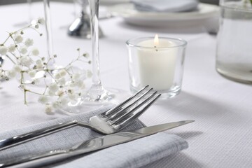 Beautiful table setting with floral decor, closeup