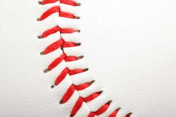 Baseball ball with stitches as background, closeup